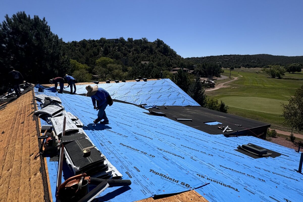 Roofing team installs new roof on Arizona home, dedicated to quality and precision in craftmanship.
